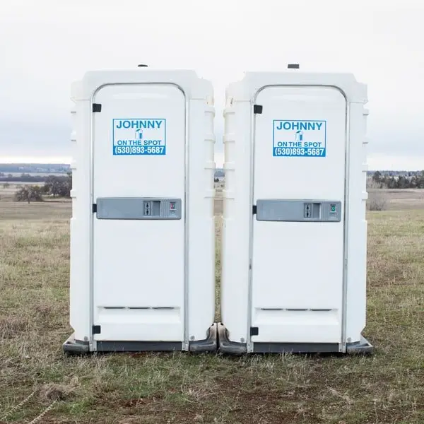 two wedding portable restroom units