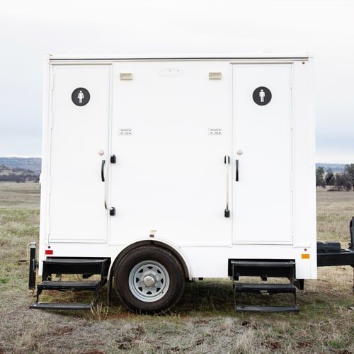 White portable restroom trailer for weddings and events in Chico, CA